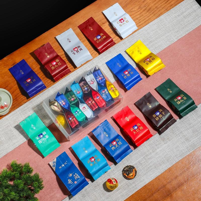 Premium Tea Sampler Set of 16 Exquisite Varieties - Golden Monkey, Jin Jun Mei, Cinnamon, Jasmine, Iron Goddess tea, Green Tea Blends & White Tea Delights - Dwtea.com